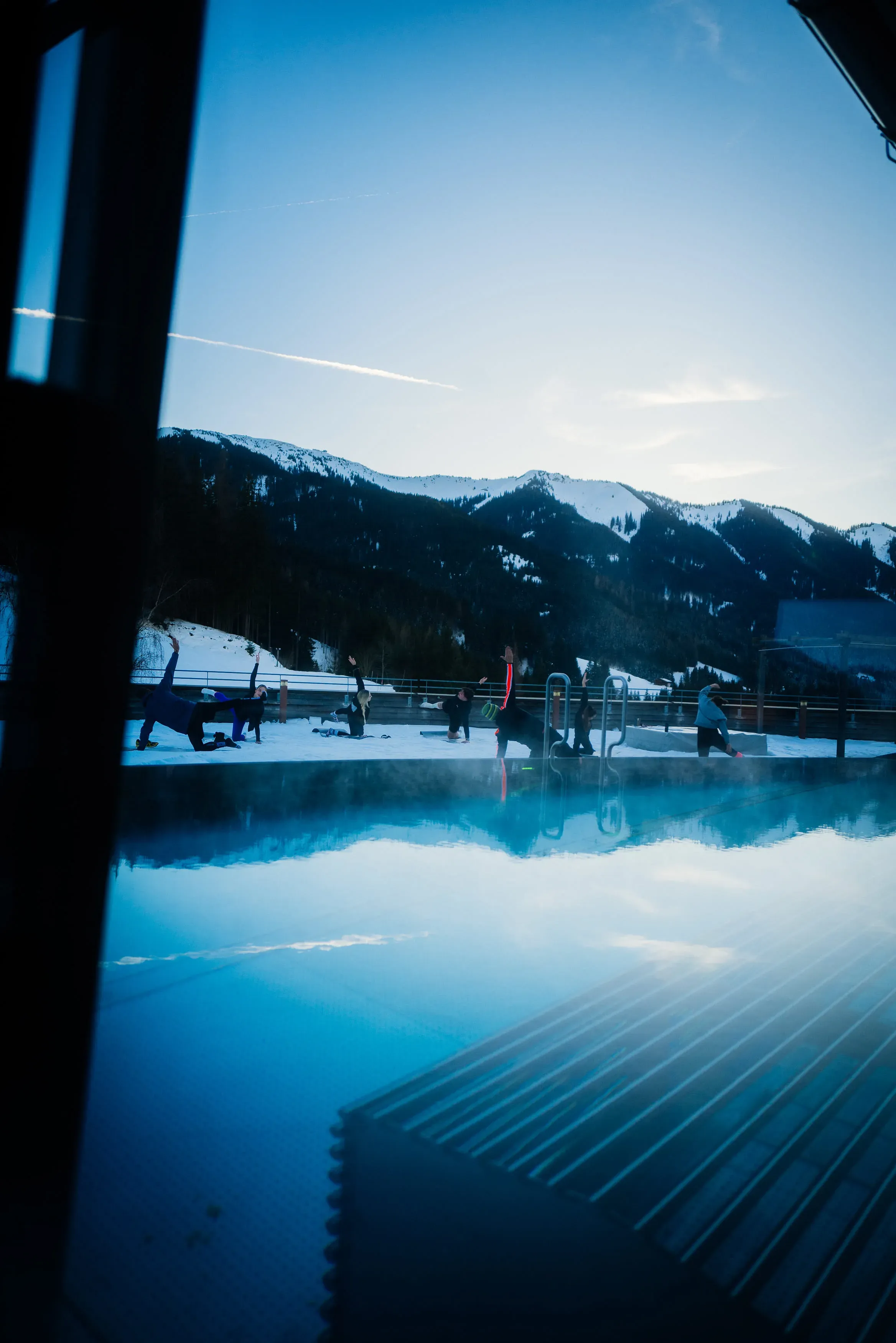 Yoga in the snow on the roof terrace