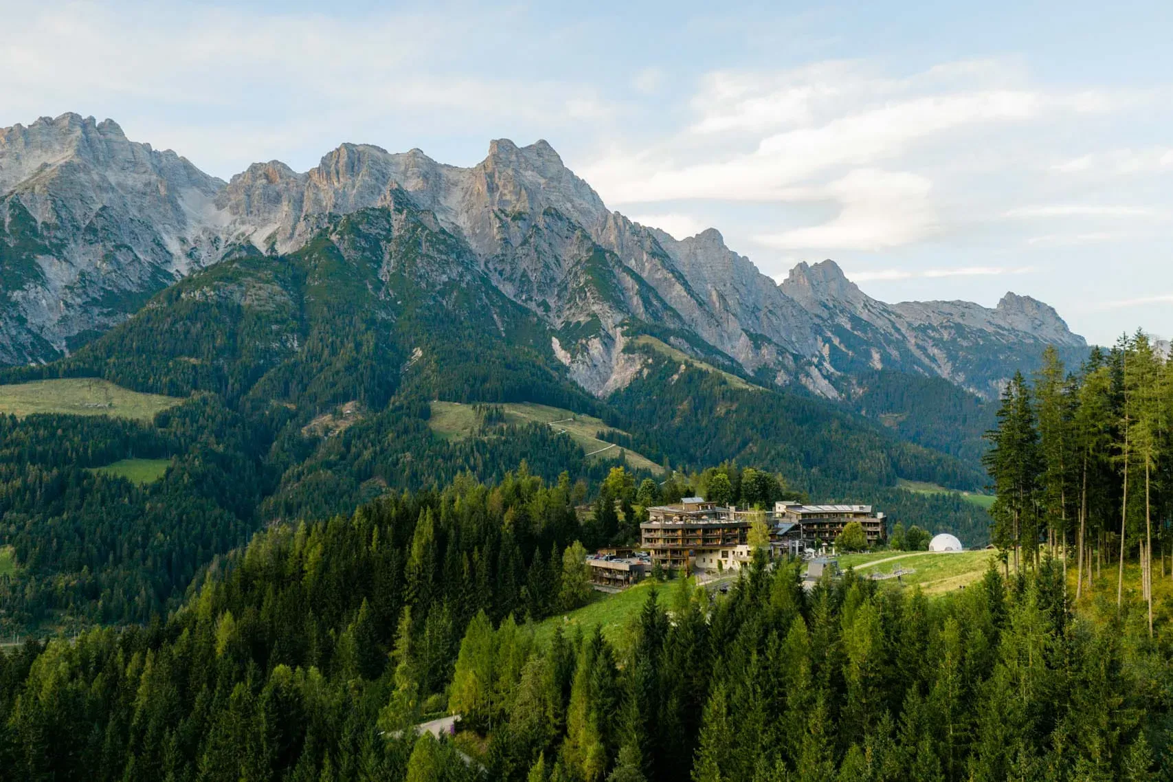Mountain hotel against a mountain backdrop
