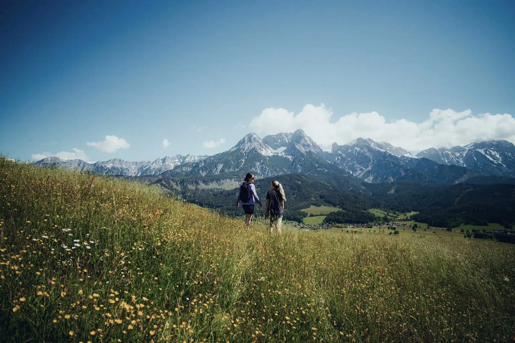 Two women hiking in summer